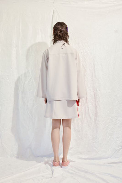Asymmetrical shirt jacket with flared cuffs