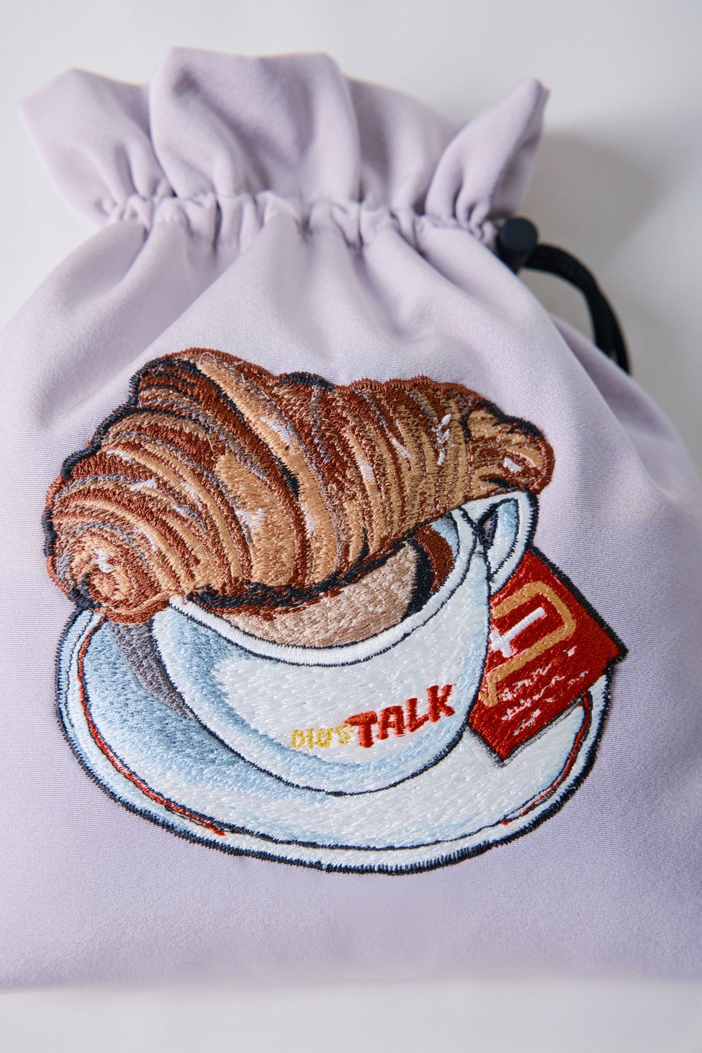 Drawstring pouches and croissants