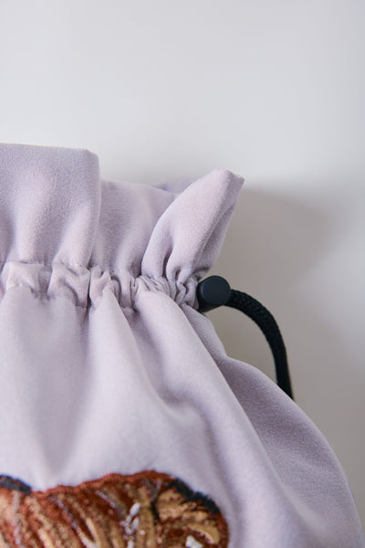 Drawstring pouches and croissants