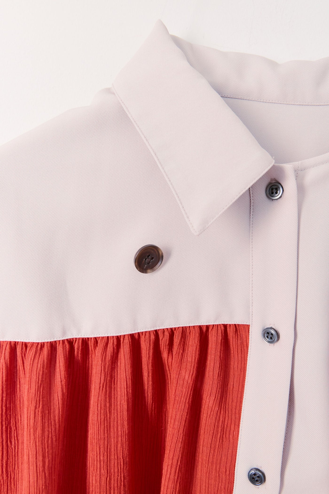 Asymmetrical shirt jacket with flared cuffs
